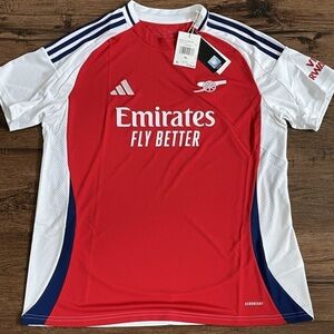 Arsenal soccer jersey brand new, never worn size medium, comes with tags.
